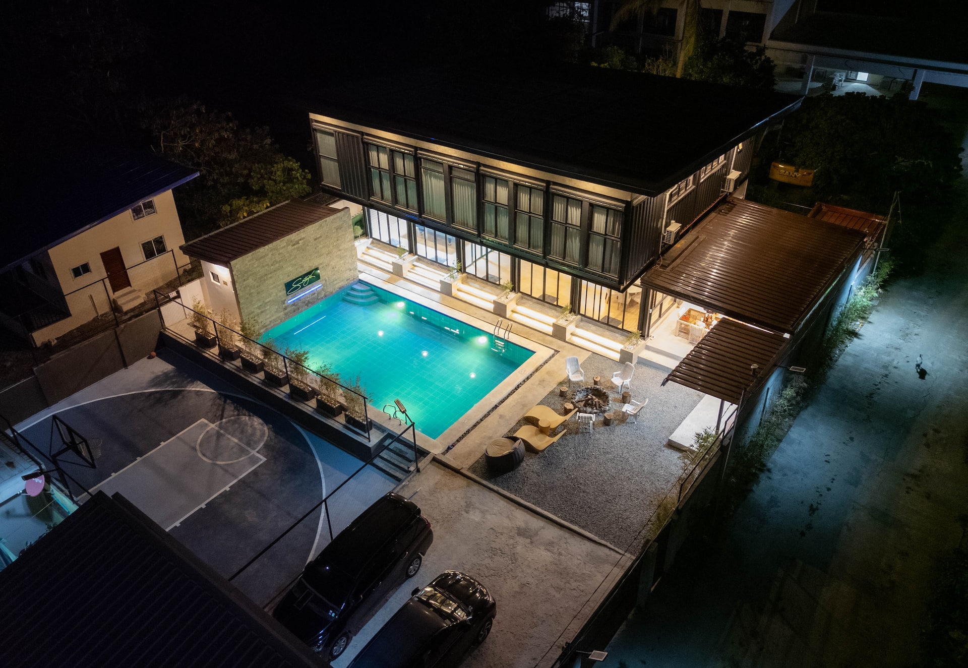 Night aerial view of the private Santiagos Resort compound