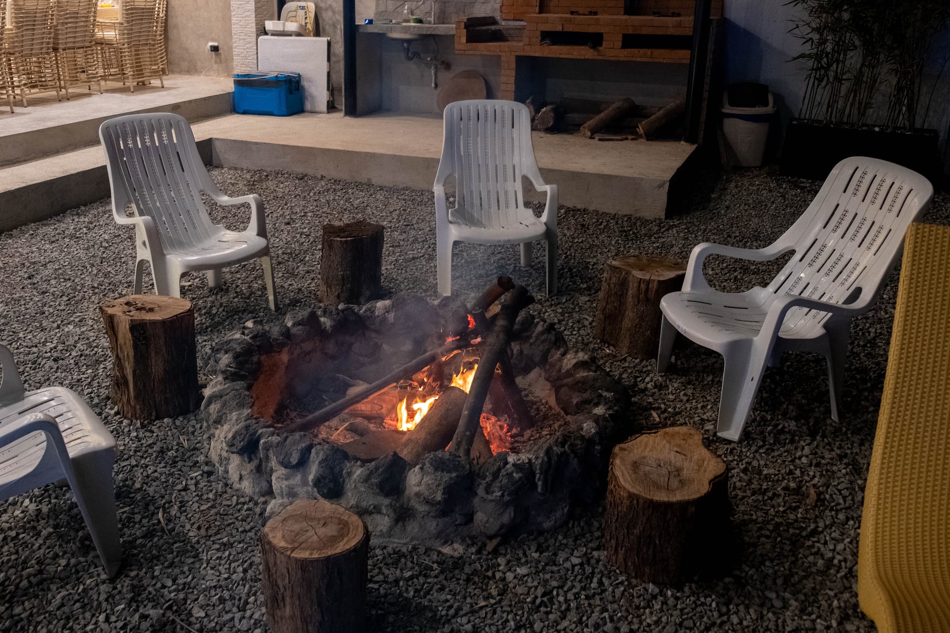 Outdoor bonfire pit with seating inside the compound